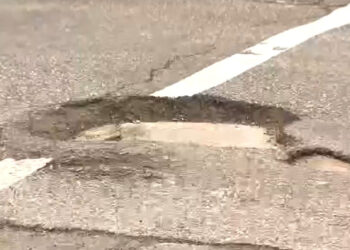 18-Year-Old Metro Detroit Pothole Filler Shows The City How To Do Their Job