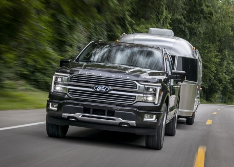 Fired Employee Accused of Shooting Ford Dealership and Slashing 50 Tires