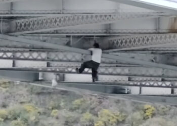 Suspected Car Thief Spider-Mans Through Underside Of Bridge Trying To Escape Police